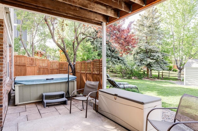 9867 W Berry Dr, Littleton, CO 80123 - view of patio with a hot tub