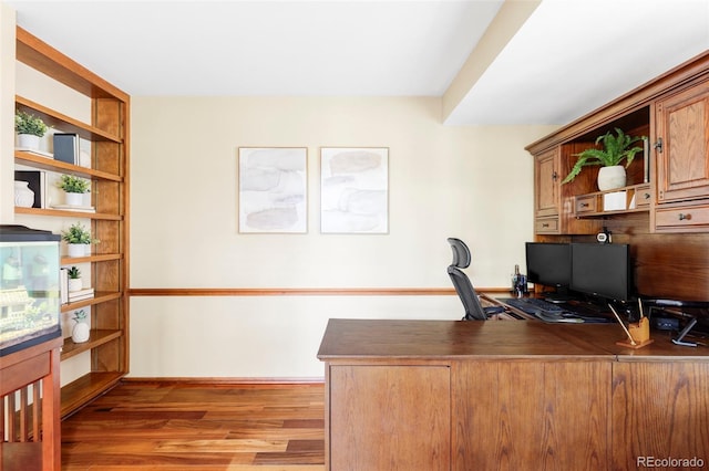 9867 W Berry Dr, Littleton, CO 80123 - office area with wood finished floors and baseboards