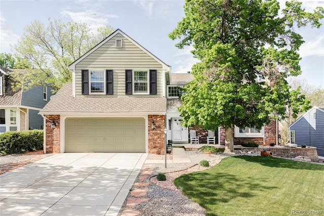 9867 W Berry Dr, Littleton, CO 80123 - view of front of home featuring concrete driveway, brick siding, a garage, roof with shingles, and a front yard