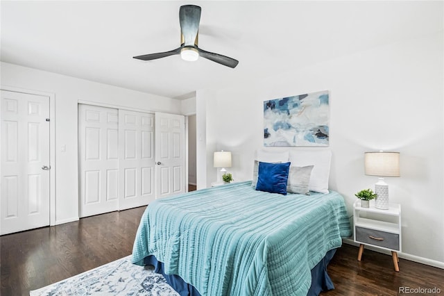 bedroom featuring a ceiling fan, a closet, baseboards, and wood finished floors