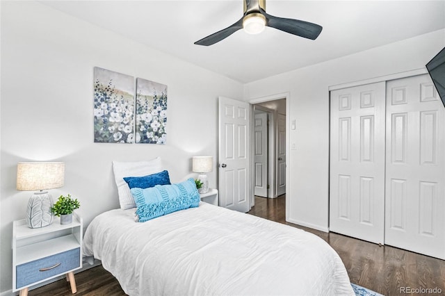 bedroom with baseboards, a closet, a ceiling fan, and wood finished floors