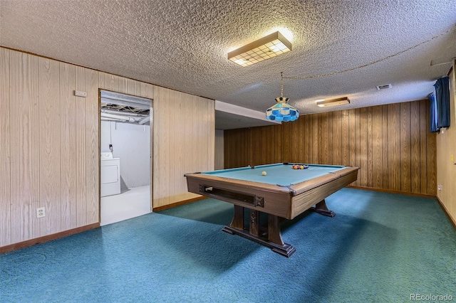 game room with washer / dryer, billiards, wooden walls, carpet, and a textured ceiling