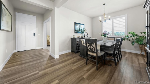 27994 E Indore Dr, Aurora, CO 80016 - dining space with a chandelier and wood finished floors