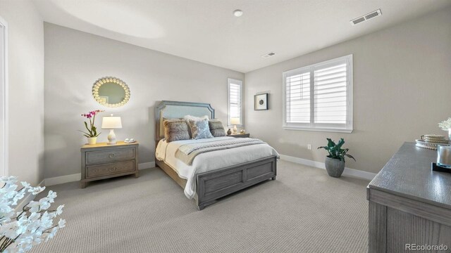 27994 E Indore Dr, Aurora, CO 80016 - bedroom with light colored carpet and baseboards