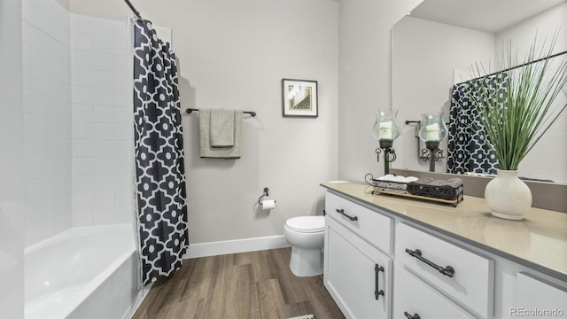 27994 E Indore Dr, Aurora, CO 80016 - bathroom with wood finished floors, vanity, and shower / bath combination with curtain