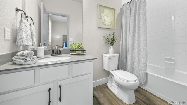 27994 E Indore Dr, Aurora, CO 80016 - bathroom featuring wood finished floors, vanity, and shower / bathtub combination with curtain