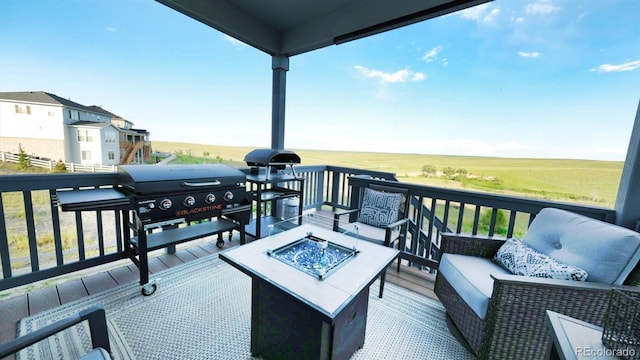 27994 E Indore Dr, Aurora, CO 80016 - wooden terrace with an outdoor living space with a fire pit