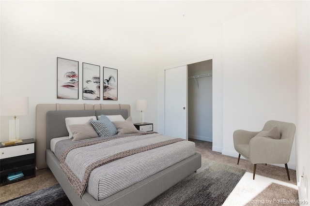 bedroom featuring a closet and carpet