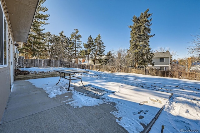 view of yard covered in snow