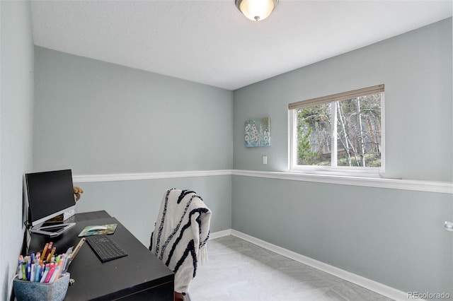 office featuring baseboards