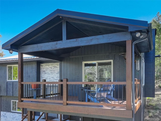 back of house featuring a deck