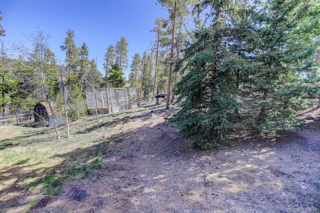 view of yard with fence
