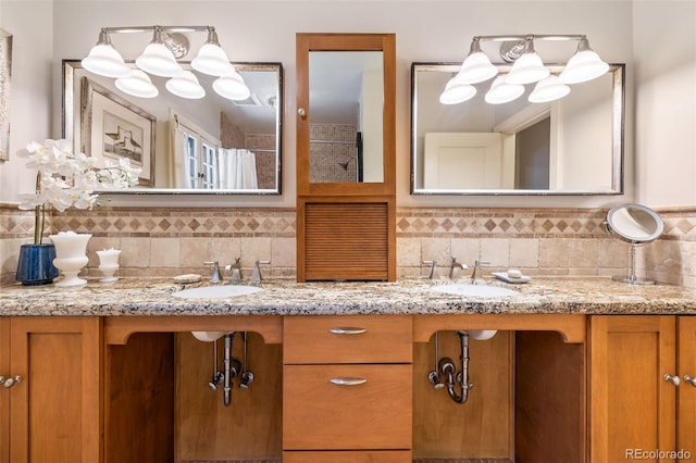 810 Milwaukee St, Denver, CO 80206 - full bathroom with double vanity and backsplash