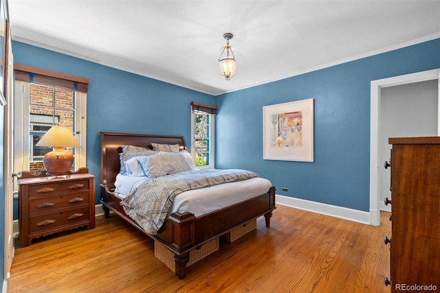 810 Milwaukee St, Denver, CO 80206 - bedroom with wood finished floors and ornamental molding