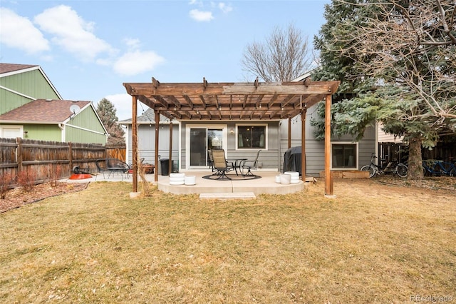 back of house with a patio area, fence, a lawn, and a pergola