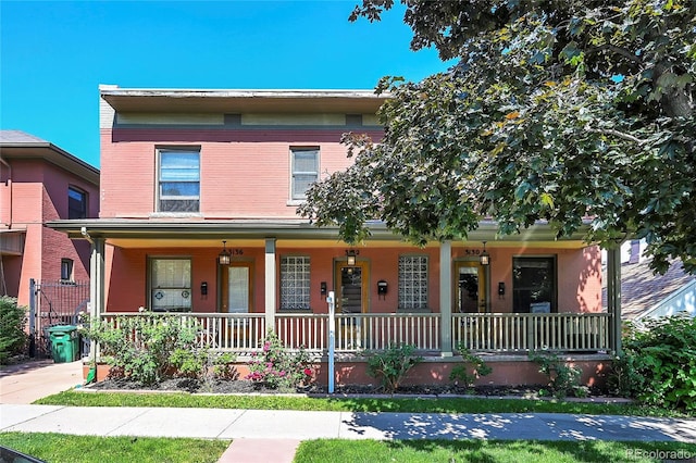 view of front of home featuring covered porch