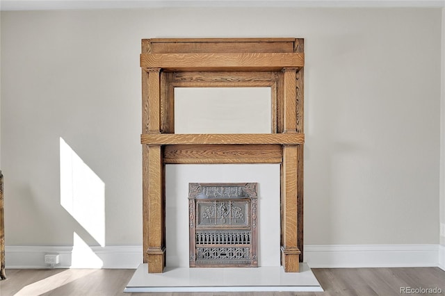 interior details with hardwood / wood-style flooring