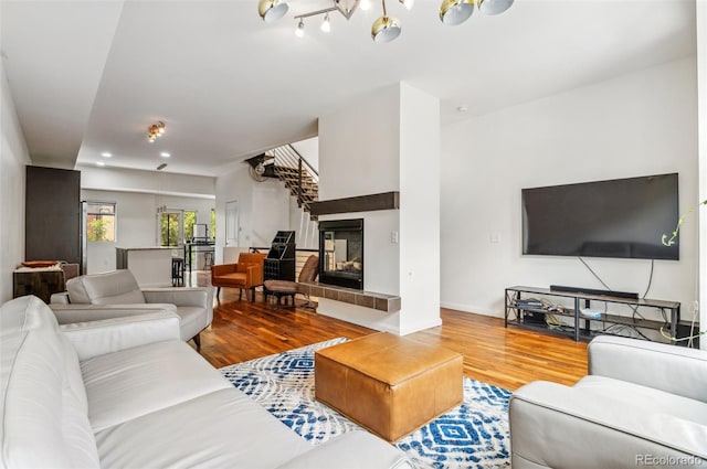2325 Walnut St Unit 4, Denver, CO 80205 - living area featuring wood finished floors, a fireplace, baseboards, and recessed lighting