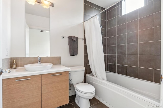 2325 Walnut St Unit 4, Denver, CO 80205 - bathroom featuring vanity, toilet, shower / bathtub combination with curtain, tile patterned flooring, and decorative backsplash