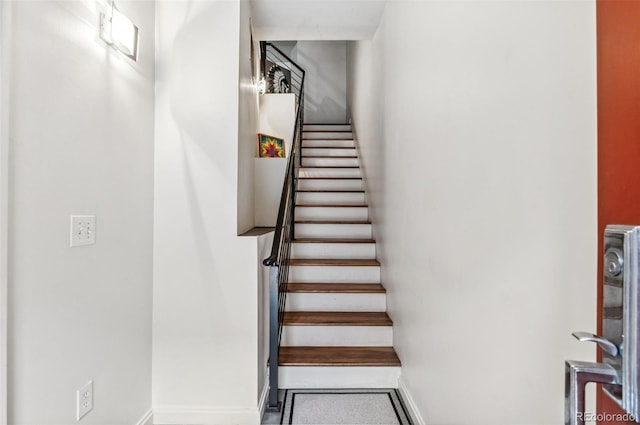 2325 Walnut St Unit 4, Denver, CO 80205 - stairway featuring baseboards