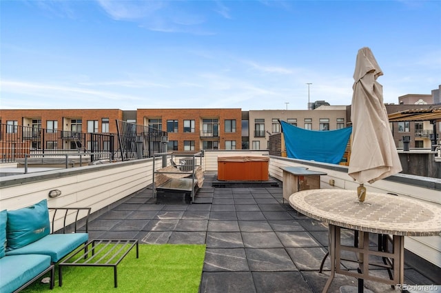 2325 Walnut St Unit 4, Denver, CO 80205 - view of patio featuring a hot tub