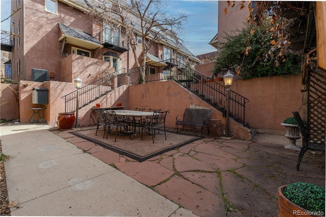 view of patio featuring stairs
