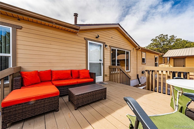 wooden deck featuring an outdoor living space