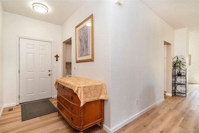 foyer featuring light hardwood / wood-style flooring