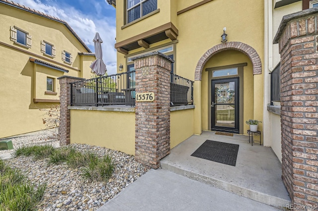 15576 W Washburn Cir, Lakewood, CO 80228 - view of exterior entry with stucco siding