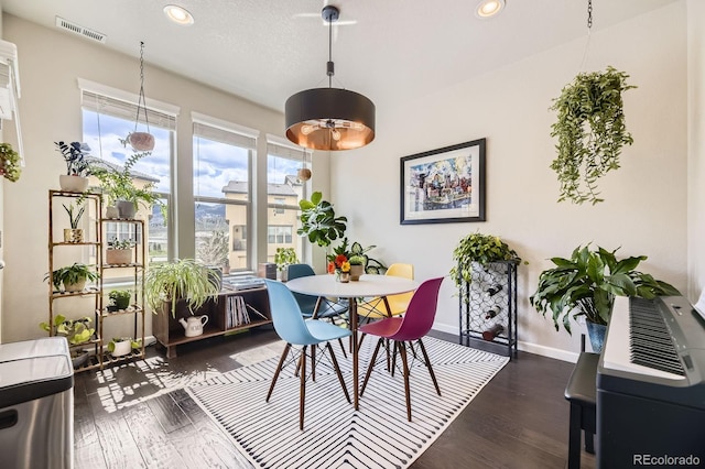 15576 W Washburn Cir, Lakewood, CO 80228 - dining space featuring recessed lighting, baseboards, and wood finished floors