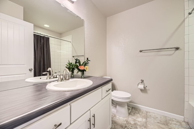 15576 W Washburn Cir, Lakewood, CO 80228 - bathroom with vanity, a shower with shower curtain, toilet, and baseboards