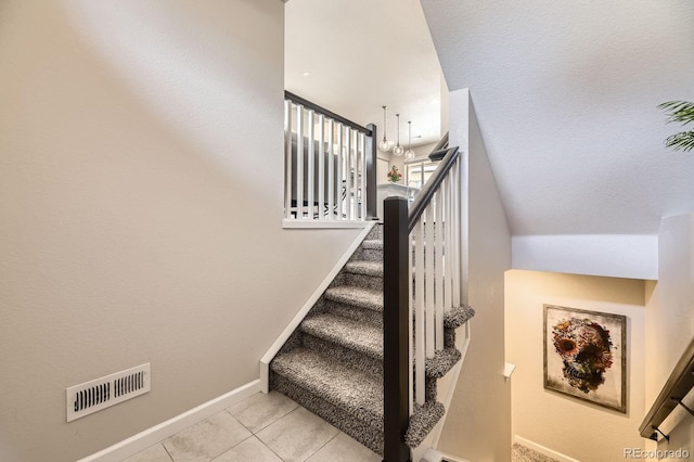 15576 W Washburn Cir, Lakewood, CO 80228 - stairway featuring baseboards and tile patterned floors