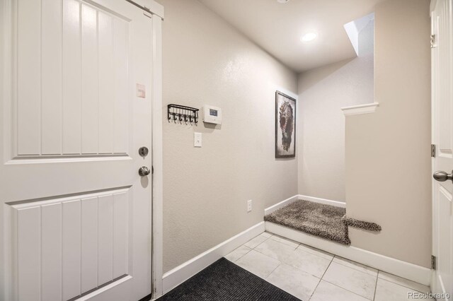 15576 W Washburn Cir, Lakewood, CO 80228 - entryway featuring baseboards
