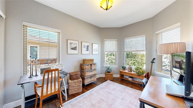 6945 N Fargo Trl, Littleton, CO 80125 - office area featuring dark wood-style floors and baseboards