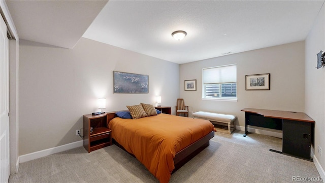 6945 N Fargo Trl, Littleton, CO 80125 - bedroom featuring baseboards and light colored carpet