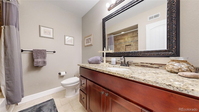 6945 N Fargo Trl, Littleton, CO 80125 - bathroom featuring toilet, vanity, tile patterned floors, and baseboards