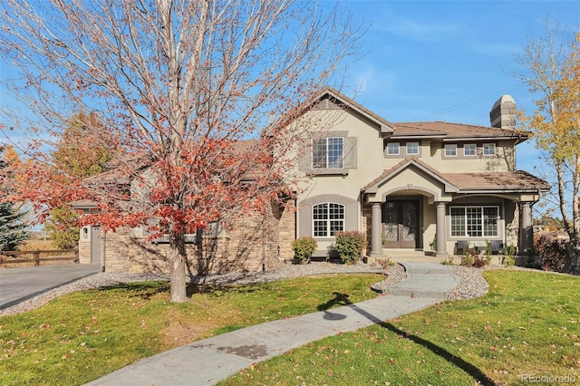 view of front of home featuring a front lawn