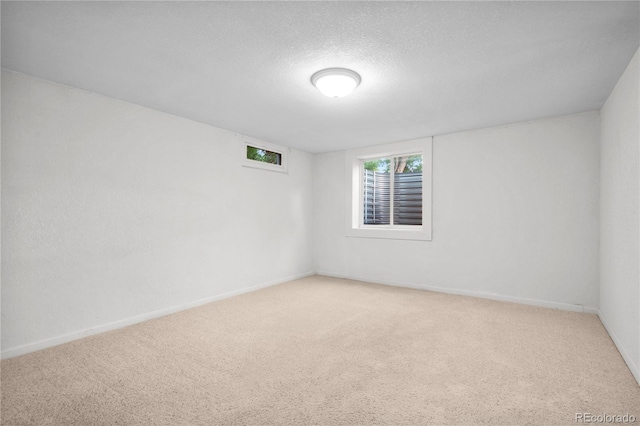 6243 S Elati St, Littleton, CO 80120 - empty room featuring carpet and a textured ceiling