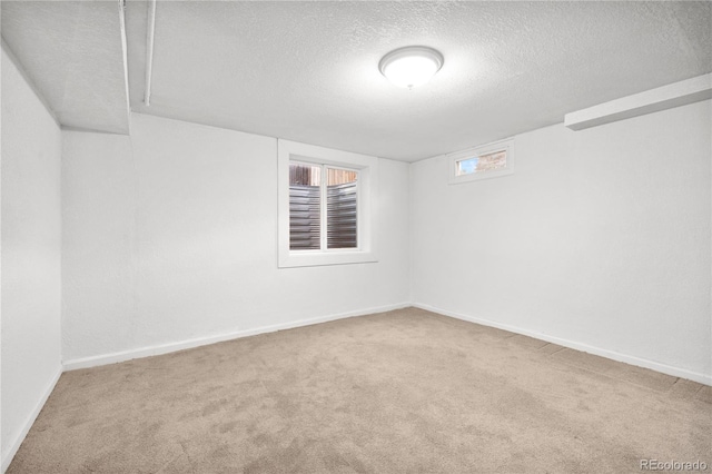 6243 S Elati St, Littleton, CO 80120 - carpeted spare room with a textured ceiling and baseboards