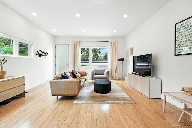 4129 Zenobia St, Denver, CO 80212 - living room with plenty of natural light, light wood-style floors, and recessed lighting