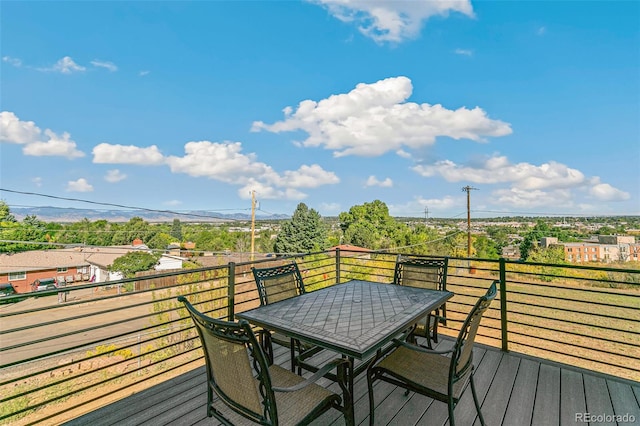 5385 W 51st Ave, Denver, CO 80212 - wooden deck featuring outdoor dining space and a mountain view
