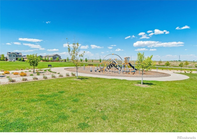 community playground featuring a yard