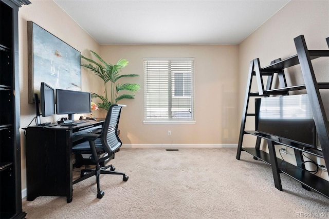 view of carpeted office space