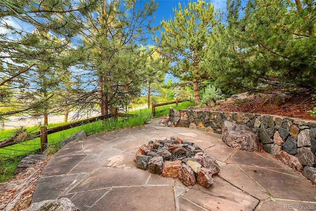 24965 E Roxbury Pl, Aurora, CO 80016 - view of patio / terrace featuring an outdoor fire pit
