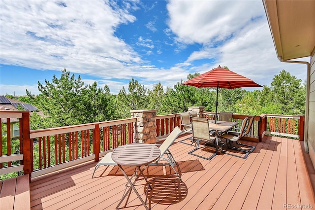 24965 E Roxbury Pl, Aurora, CO 80016 - wooden terrace featuring outdoor dining space