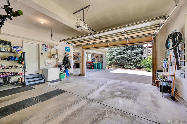 24965 E Roxbury Pl, Aurora, CO 80016 - garage featuring a garage door opener