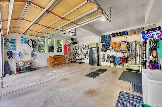 24965 E Roxbury Pl, Aurora, CO 80016 - garage featuring a garage door opener