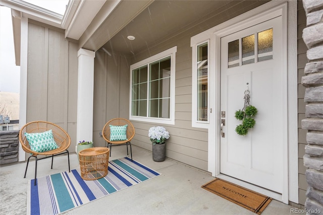 6657 S Kline Way, Littleton, CO 80127 - view of exterior entry with board and batten siding