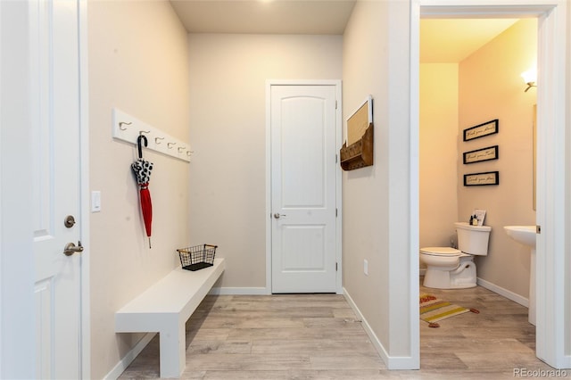 6657 S Kline Way, Littleton, CO 80127 - mudroom featuring light wood-style floors and baseboards