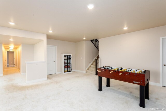6657 S Kline Way, Littleton, CO 80127 - recreation room featuring light colored carpet, recessed lighting, and baseboards